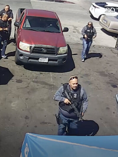 ICE raiding an autoshop with assault weapons