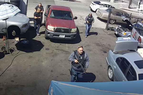 ICE raiding an autoshop with assault weapons