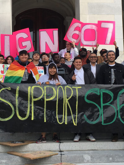 People rallying at the state Capitol in support of SB 607