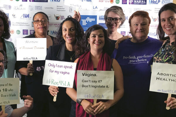 Roe v. Wade event, people holding signs in support of abortion rights