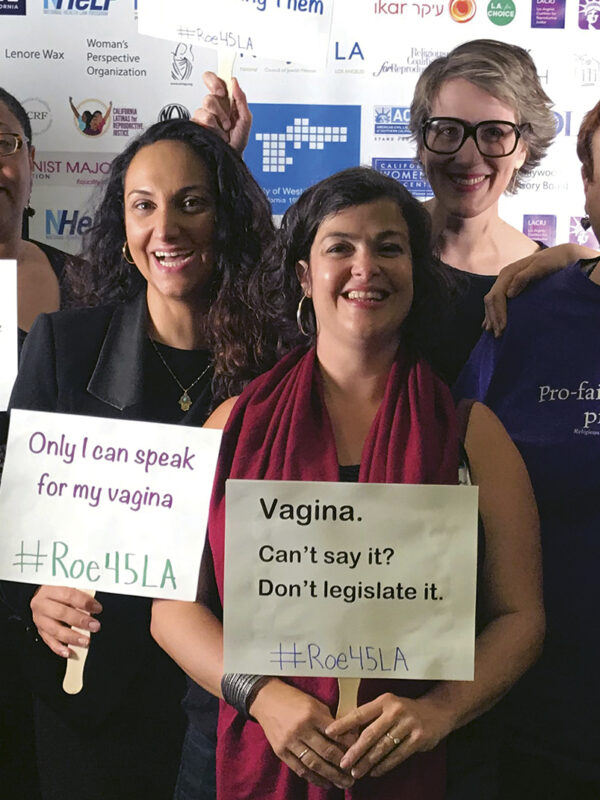 Roe v. Wade event, people holding signs in support of abortion rights