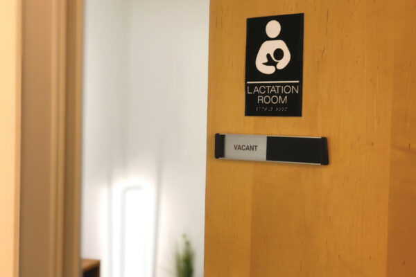 Office door with placard that reads: Lactation room