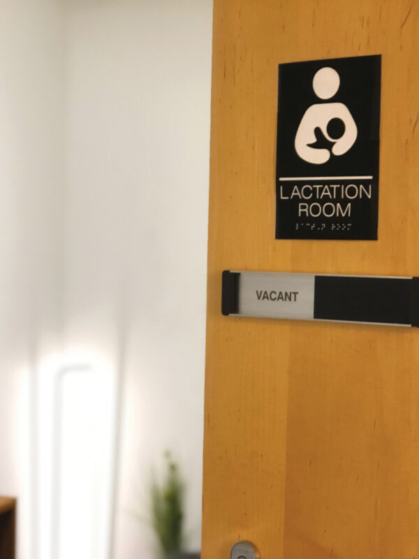 Office door with placard that reads: Lactation room