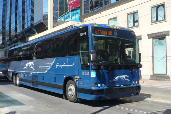 Greyhound bus on a city street