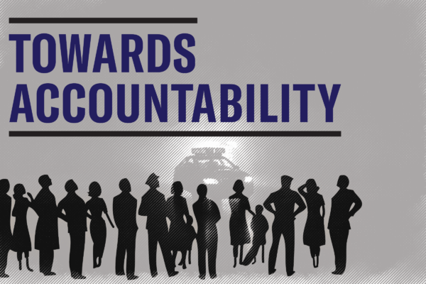 silhouette of people, including police officers in the foreground, a police car with lights in the background