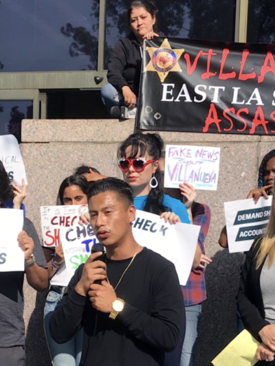 Group of activists outside the Hall of Justice protesting Los Angeles Sheriff Villanueva