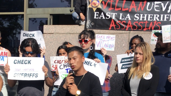 Group of activists outside the Hall of Justice protesting Los Angeles Sheriff Villanueva