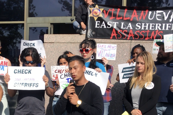 Group of activists outside the Hall of Justice protesting Los Angeles Sheriff Villanueva