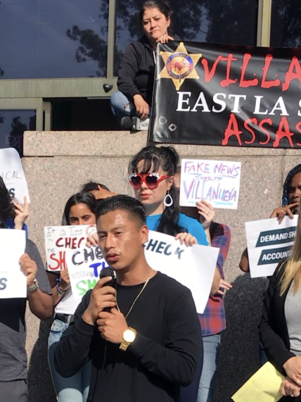 Group of activists outside the Hall of Justice protesting Los Angeles Sheriff Villanueva