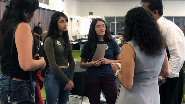 Students at Pomona Unified District talking to school board members