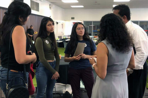 Students at Pomona Unified District talking to school board members