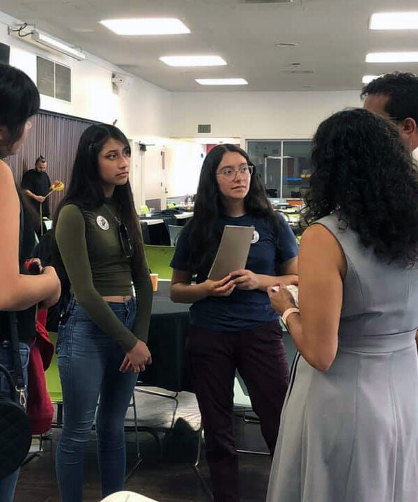 Students at Pomona Unified District talking to school board members