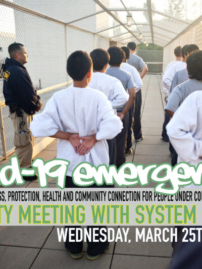 Image of young men in a juvenile hall courtyard, lined with their hands behind their backs. Text: Covid-19 emergency