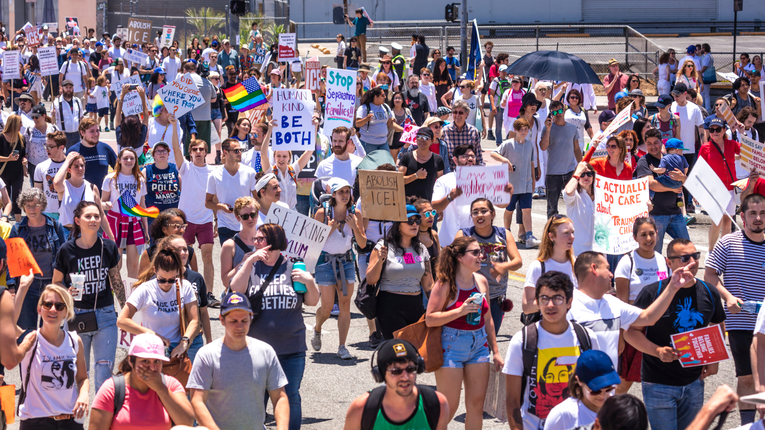 Crowd holding signs