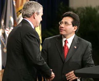 Bush and Gonzales shaking hands