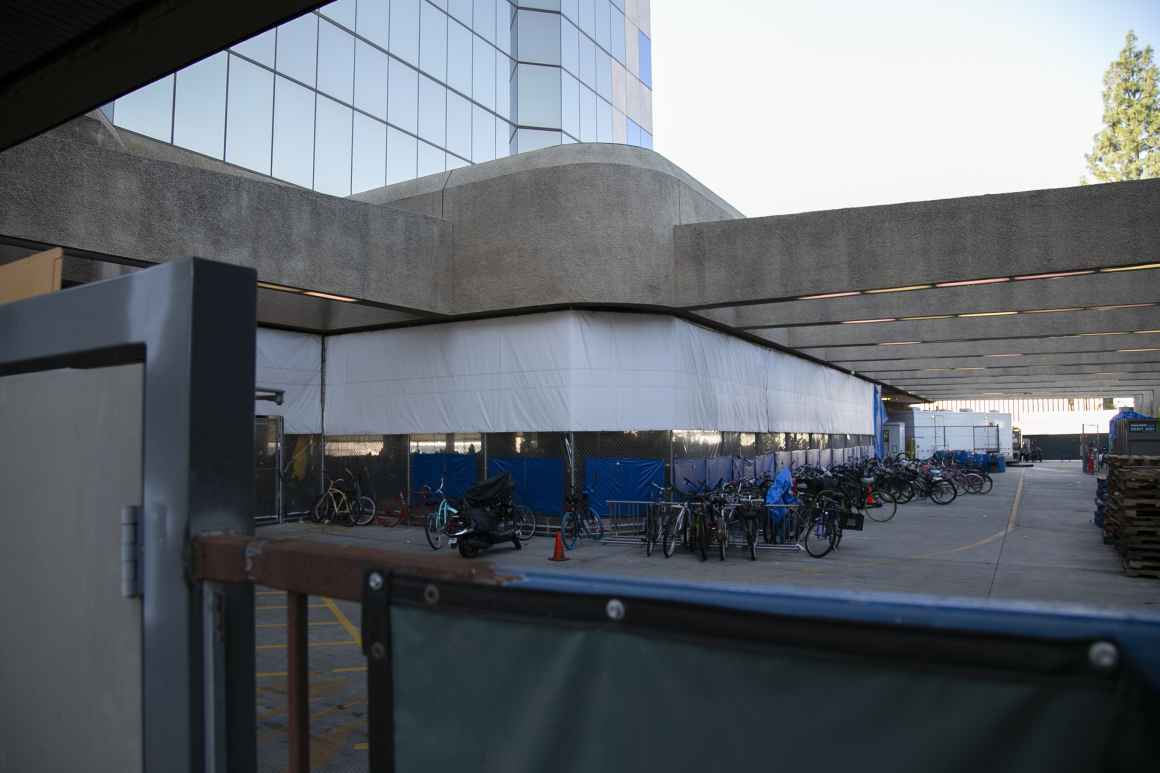 Unhoused people don’t lose their civil rights at the shelter door Courtyard tarp
