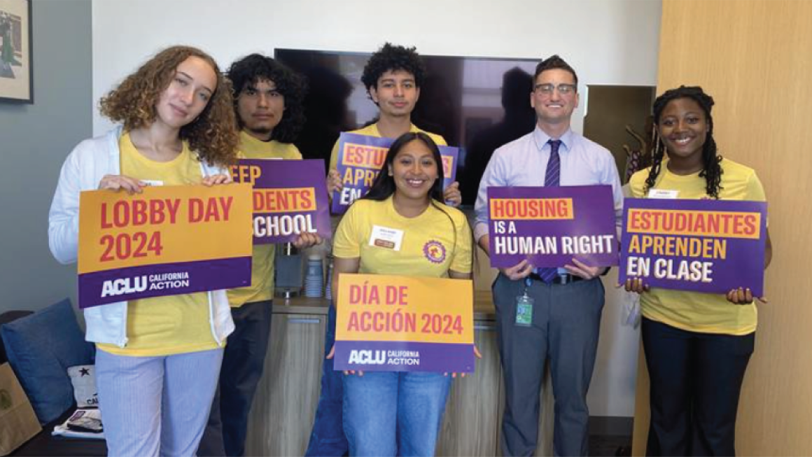 ACLU supporters holding Lobby Day 2024 signs