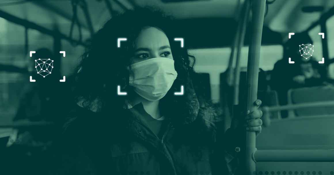 A simulation of facial recognition technology: a photograph of a woman on a public bus wearing a mask with graphics overlayed indicating that the software is scanning her face.