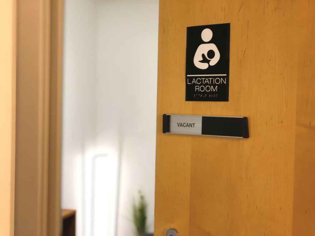 Office door with placard that reads: Lactation room