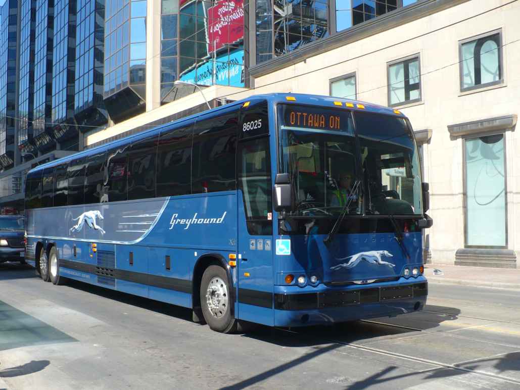 Greyhound bus on a city street