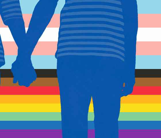 Two people holding hands with LGBTQ+ flag behind them